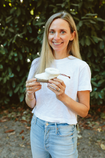 Megan Milliken '04 holds a Woolybubs shoe