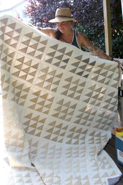 Marianne Dickson with quilt